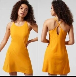 Athleta Infinity  tennis prep criss cross back dress with built in shorts